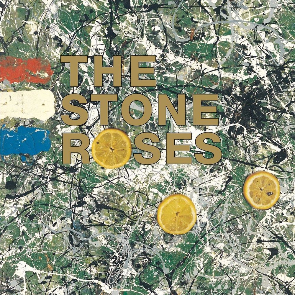 Album cover for The Stone Roses self title debuted album showing lemon slices over a Jackson Pollock type background of green white and black paint spatters, with the band name written in gold block lettering.