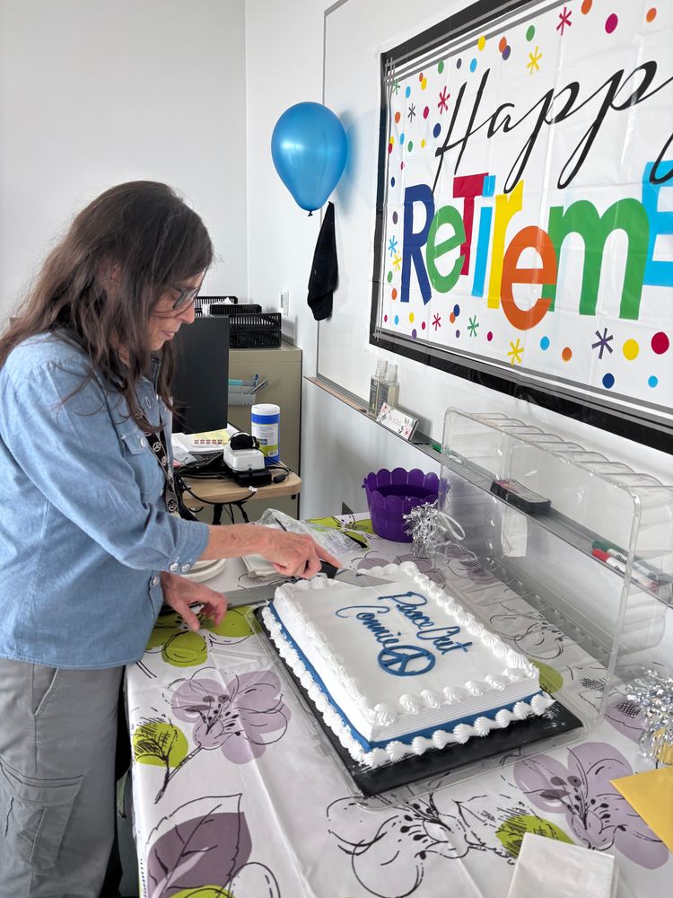 photo of my retirement cake/lunch (and me)