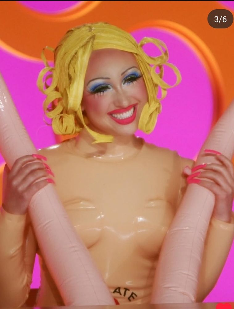 Chapell Roan in the same cunty blow up doll latex outfit sitting on the judging panel of RuPaul's Drag Race 
