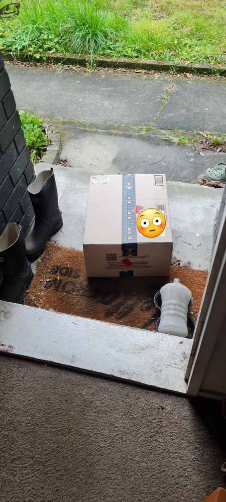 Box delievered to my front doorstep. Heavy stickers added to the box by the courier company.