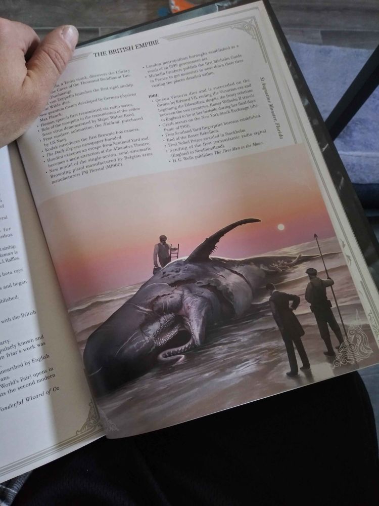 a page from Cthulhu by Gaslight: Investigators' Guide showcasing an art piece of a sea beast beached on the shoreline, a group of 3 men investigate the mangled abomination at the early monrning.