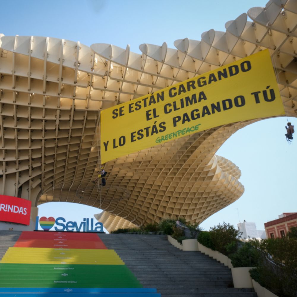 Activists from Greenpeace Spain today covered the iconic Setas de Sevilla monument with a massive banner, displaying the message: “They are destroying the planet. And you are paying for it.” The action marked the first day of the 4th International Conference on Financing for Development Conference (FfD4).