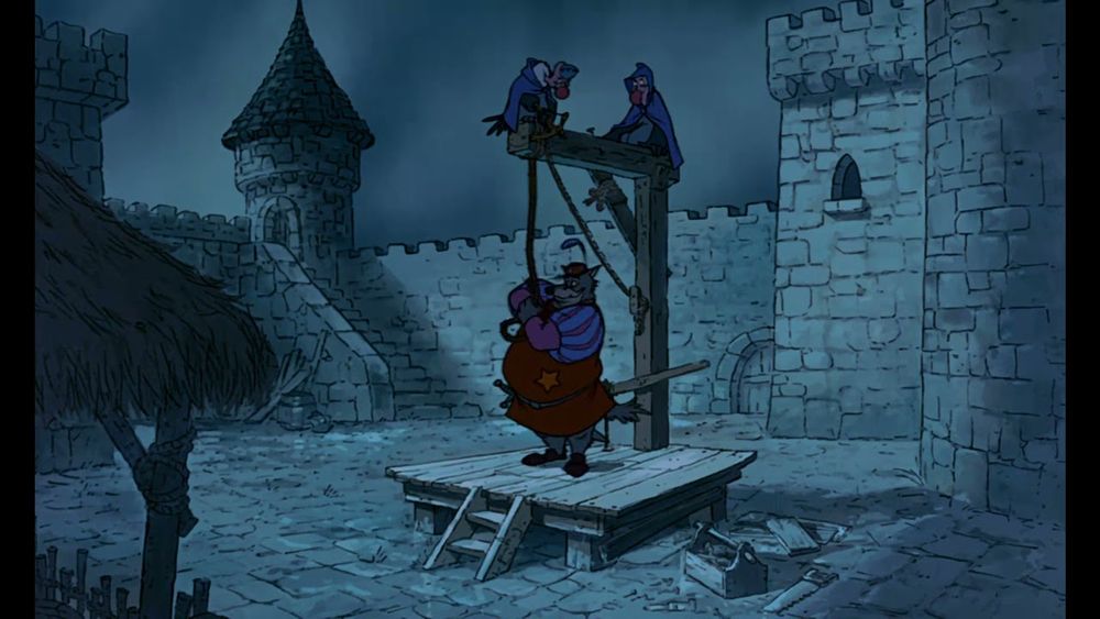 Cena de Robin Hood, mostrando o xerife de Nottingham, que é um lobo antropomórfico, preparando uma forca no pátio do castelo, com dois urubus antropomórficos pousados acima. 