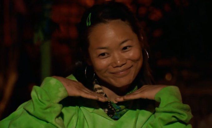 Survivor 48 contestant Mary Zheng smiling with her hands held under her chin.