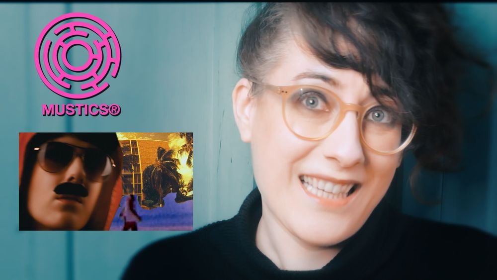 Meljoann smiles, wearing a black polo. A still of the music vid for 'Bye' is inset (Scout Hardcastle looking cool).