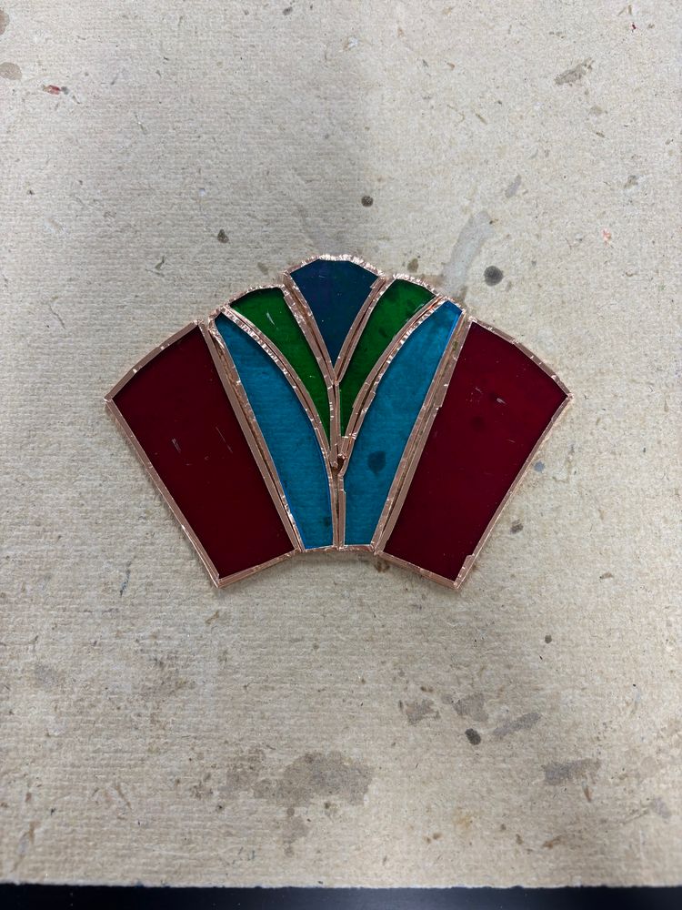 A red, blue, and green stained glass night light, pre assembly