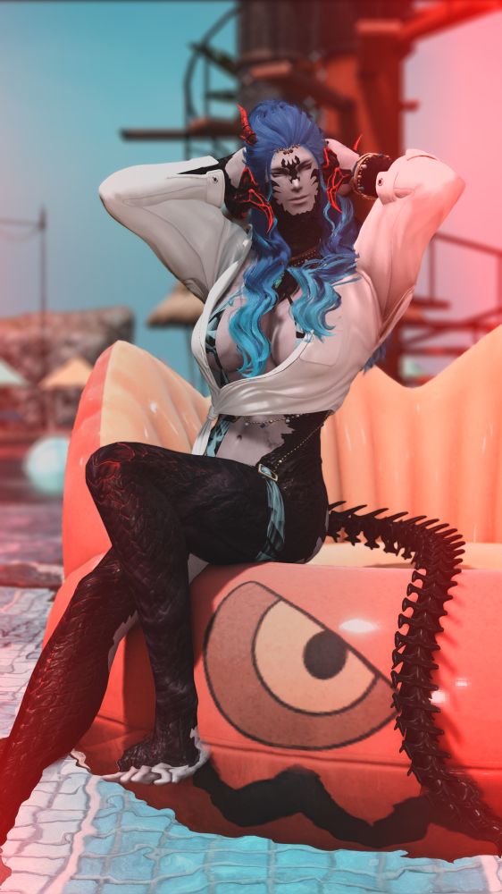 saghani sitting on a floatie in the pool of moonfire fair smiling and relaxing with her hands on her head