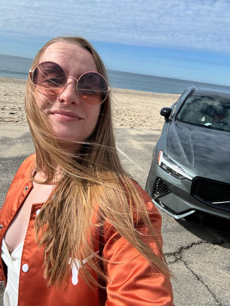 Alanis with an XC60 on the beach 