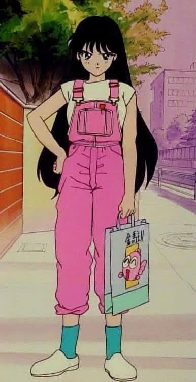 An anime girl in pink overalls, teal socks, white shoes, a white t shirt and long black hair 