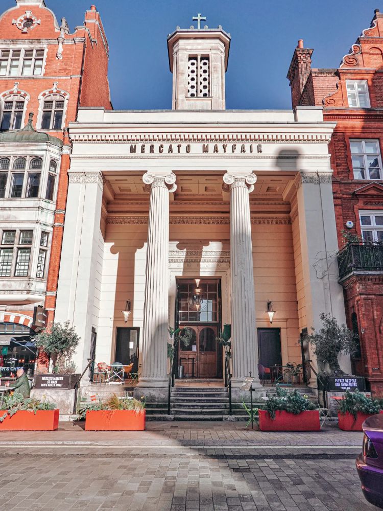 White building with Roman style columns