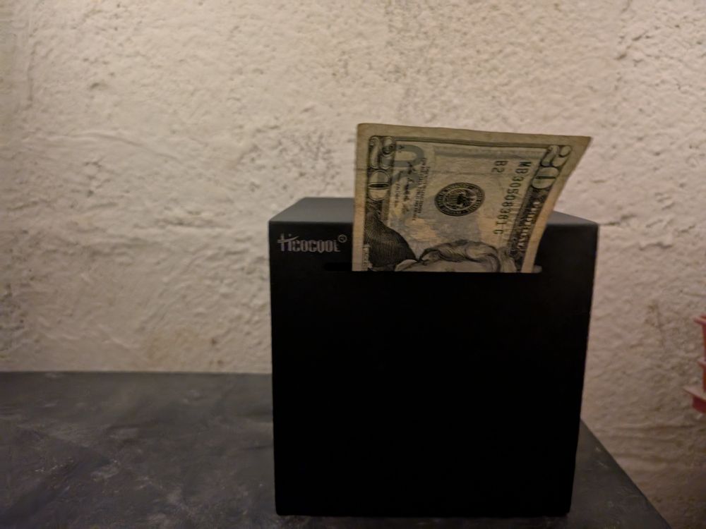 Box in some kind of prison. 