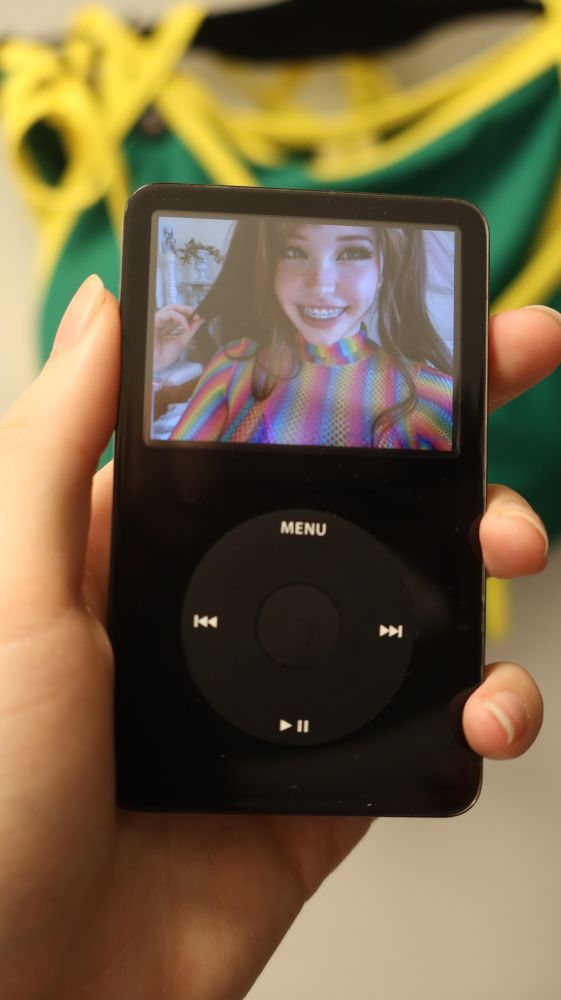 Her cute lil ipod with belle delephine on