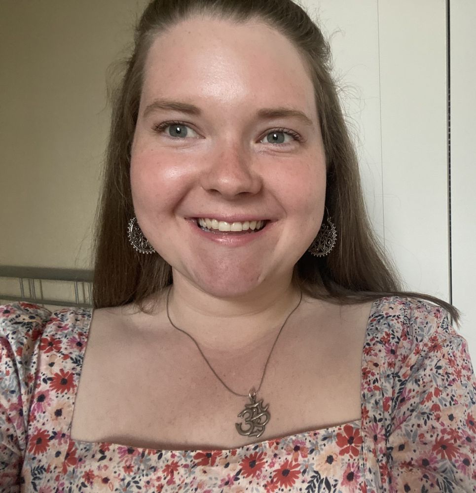 Close-up photo of a woman smiling
