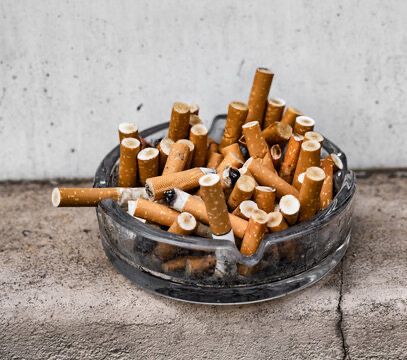 Picture of an ashtray filled with cig buds 