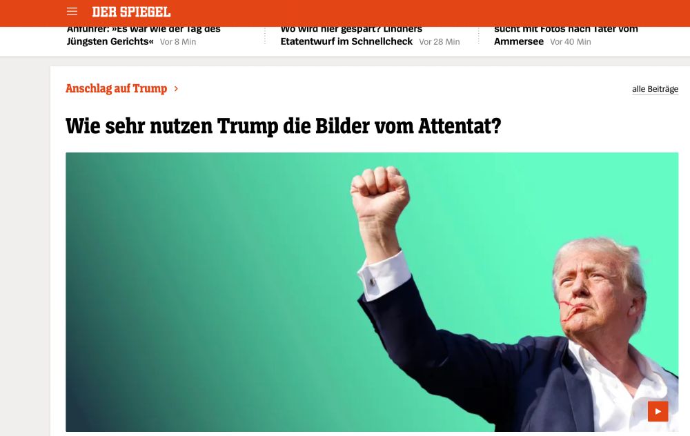Bild vom verletzten Trump nach dem Attentat aus Spiegelonline mit der Frage  Wie sehr nutzen Trump die Bilder vom Attentat?