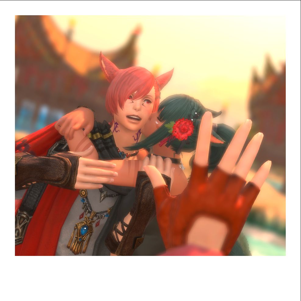 photograph of g'raha tia and a female miqote with dark green hair (warrior of light) standing in front of the cabins in tuliyollal at sunset. the warrior of light has grabbed g'raha and is kissing his cheek while he looks surprised and is blushing. alisaie's blurry hand can be seen reaching into frame, futilely trying to stop them from being gross in her picture.