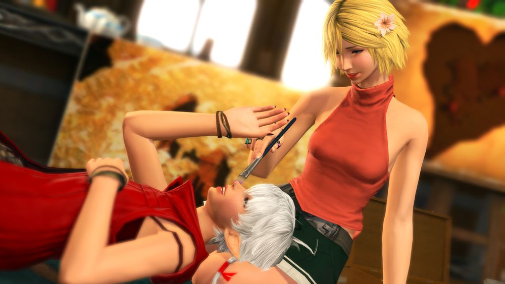 closeup of alisaie laying in arya's lap, reaching up to knock away the paintbrush that arya is holding to her face. both girls are smiling/laughing.