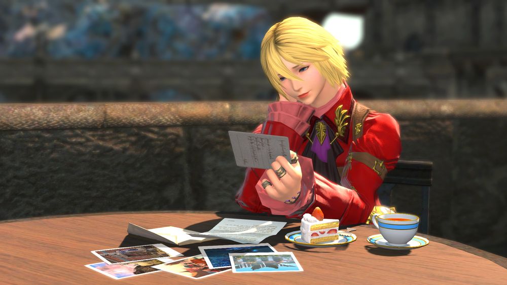 arya sits at a table on the terrace in mor dhona. she leans on the table with her cheek resting in one hand as she smiles down at a piece of paper she's holding in the other. spread out in front of her is an open envelope, an unfolded letter, and several scattered photographs. to her side is a slice of cake and a cup of tea.