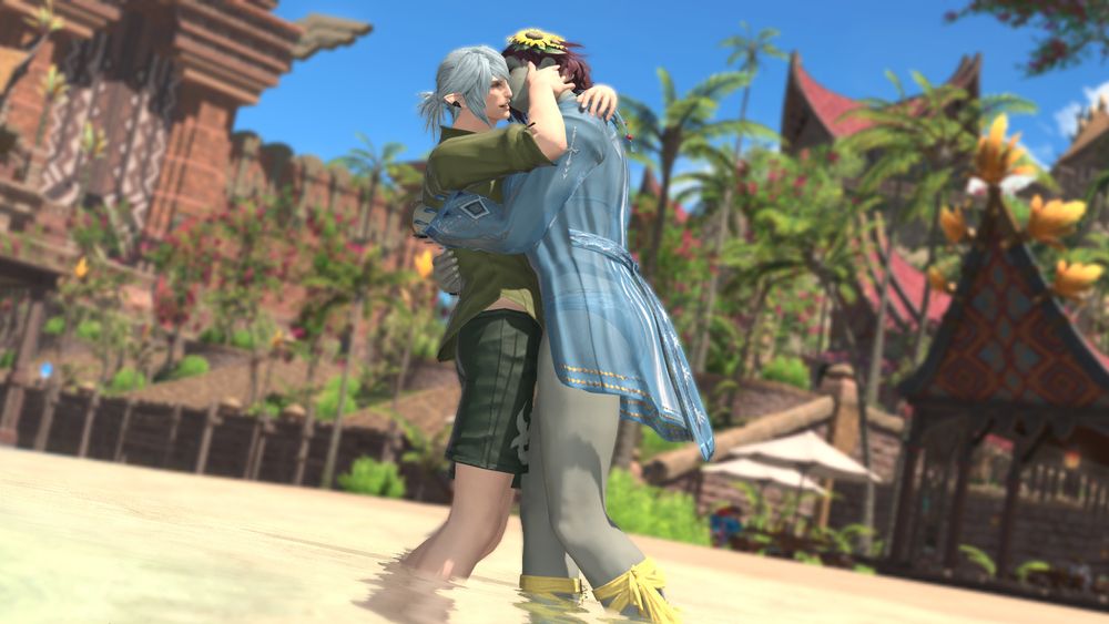 haurchefant and eyri frolicking in the shallows on a sunny beach in tural. they are embracing, with eyri kissing haurchefant on the cheek while he laughs happily.