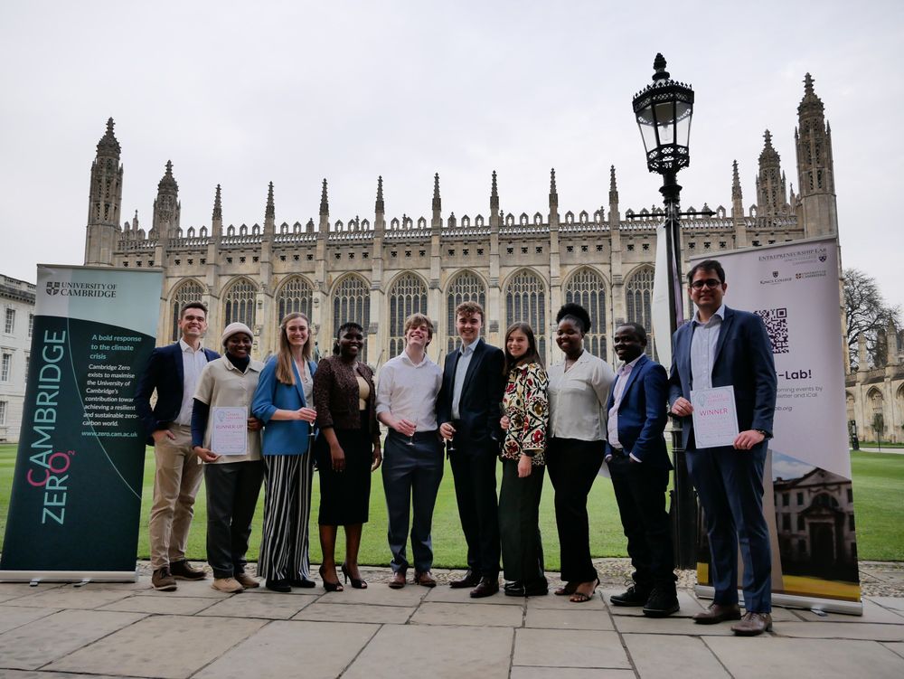 Participants of the Cambridge Climate Challenge 2025. Standing in front of a banner labelled 'Cambridge Zero' with the King's College Chapel at the University of Cambridge in the background.
 
From left to right: Laurie Leonard Hill, Hauwa Busari, Anna Winter, Sally Musonye, James Longstaff, Tom Myers, Hanna Szafranska, Maureen Abel, Jockim Kamalha, Deepanshu Singh.