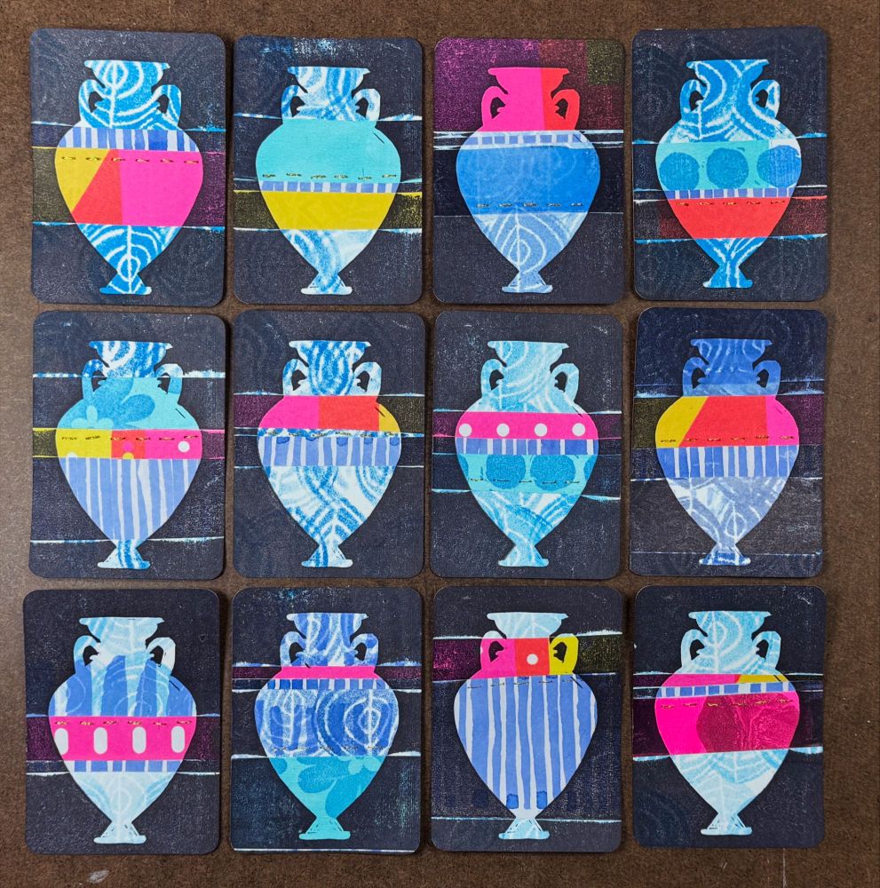 Twelve Artist Trading Cards ( 2.5 x 3.5") in three rows of four. Each card features a vase with a black background. The vases are all primarily blue and collaged with pink, yellow and/or yellow paper. Each card has a horizontal line of gold stitches.