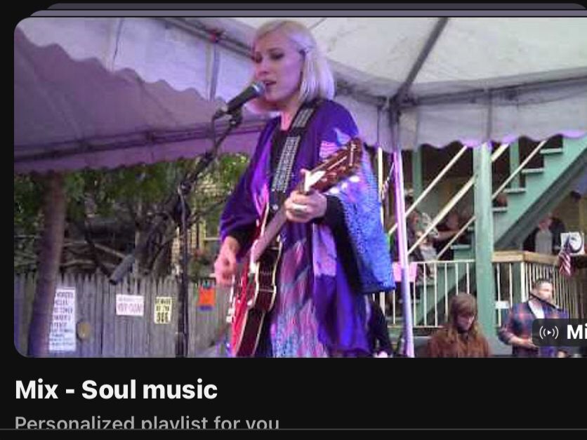 Detail of a video from YouTube. Picture of woman playing guitar from band Bloodstone over text that reads “Mix-Soul Music”