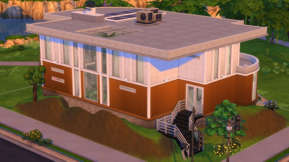 an incomplete build of a midcentury modern/Bauhaus-inspired two story house in Sims 4