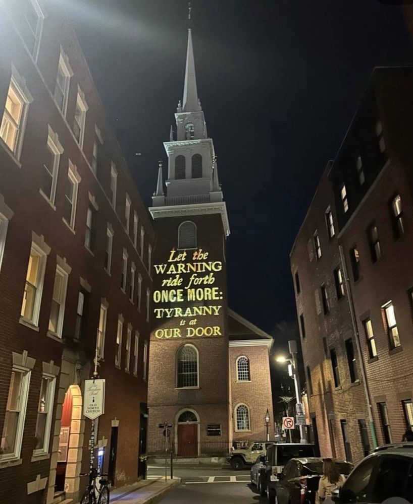 Old North Church with tyranny projection on 250th anniversary of Paul Revere’s ride.