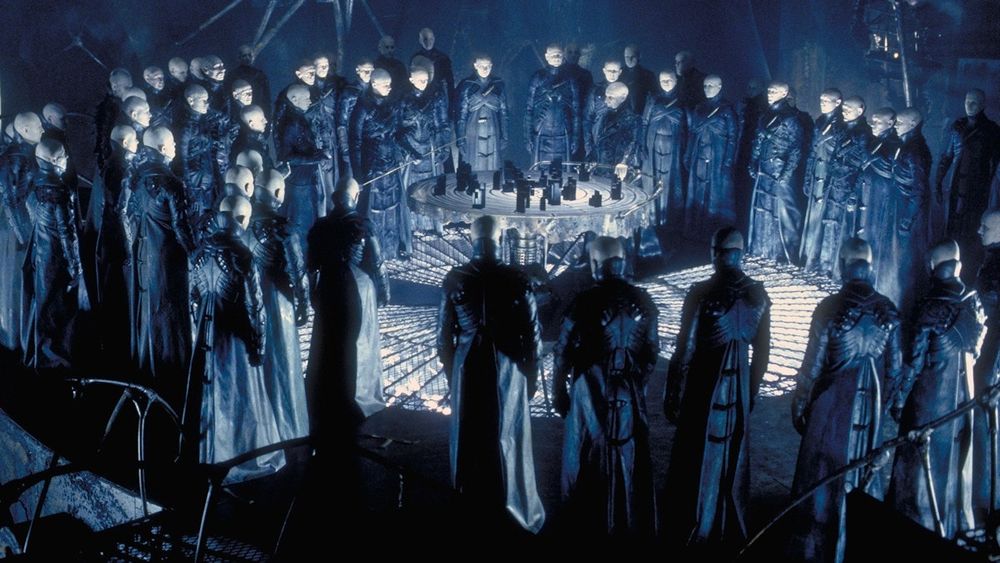 The antagonists of the movie "Dark City" who uniformly appear as bald men in leather coats.
