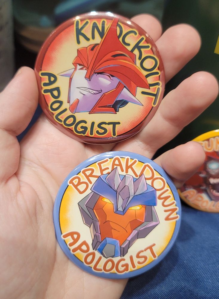 Knockout and Breakdown apologist buttons from Transformers 