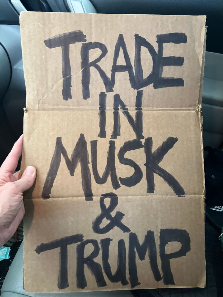 Sign reads “Trade In Musk & Trump”