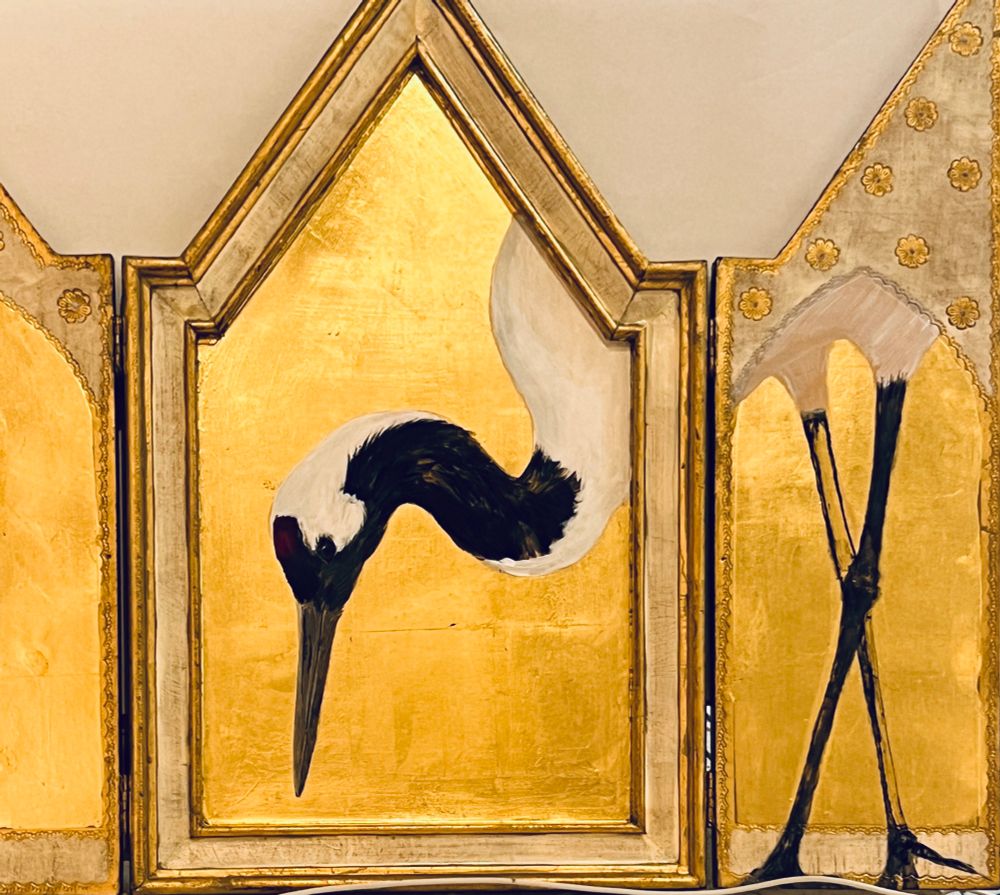 Crane bows its head on the centre panel of this triptych it’s crossed legs on the right hand panel