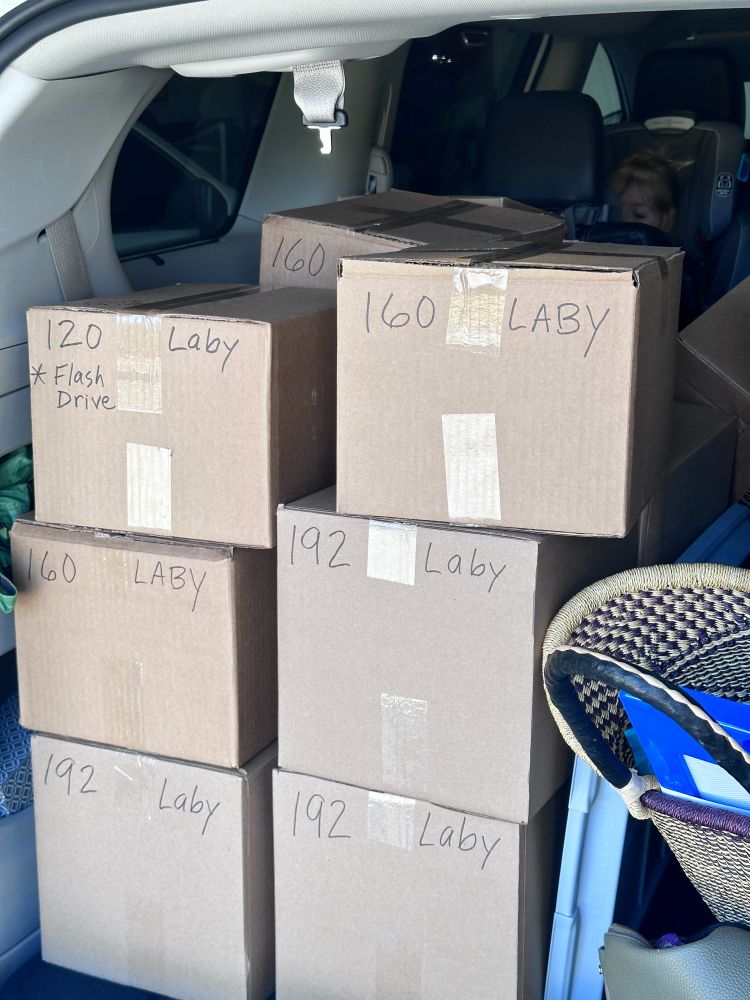 boxes of Paper Apps LABYRINTH fresh from the printer sitting in the back of my minivan