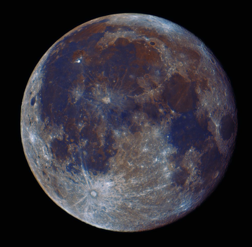 the full moon but with colors! generally, the lighter parts of the moon are orangey, and the darker parts of the moon are bluish