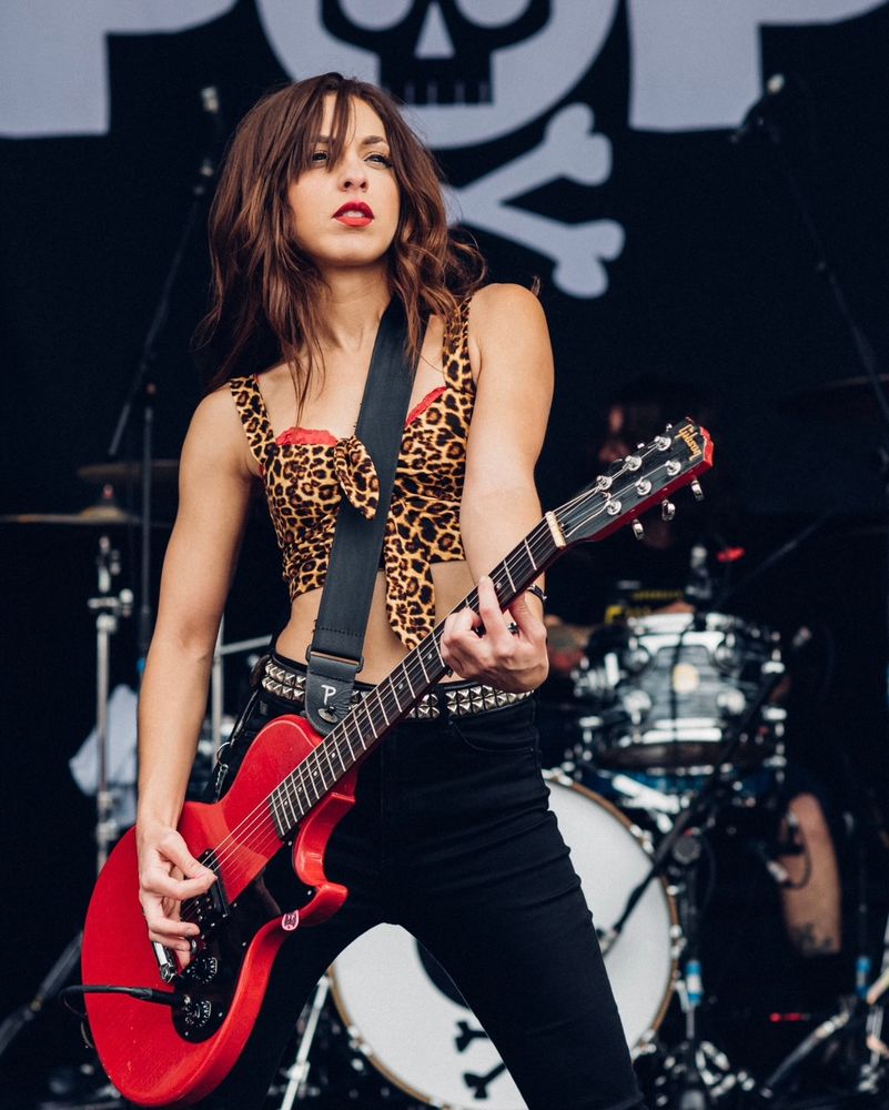 Jen Pop from The Bombpops playing a red Gibson Melody Maker