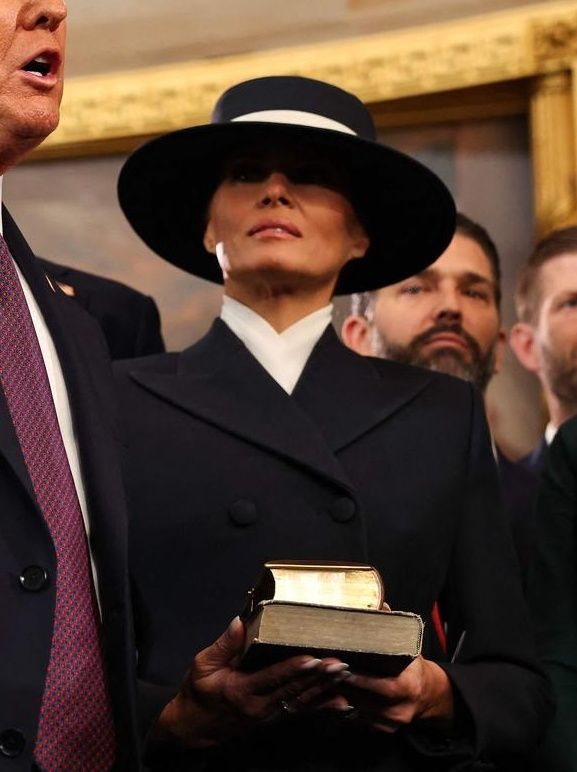Melania Trump during the oath ceremony, a
 hat covering her eyes.