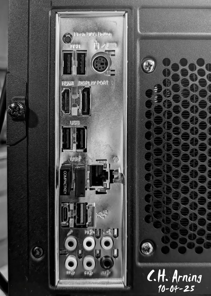 The back panel of my computer, once humming with light and purpose, now sits quietly, a maze of ports and potential gone still. I had meant to use a picture of a wet morning glory for my postcard, something living and bright. Still, when the computer quit and took that image with it, this became the story instead: the silent aftermath of failure, the machine that held my day’s beauty turned into the subject itself for my 10/14/25 postcard.