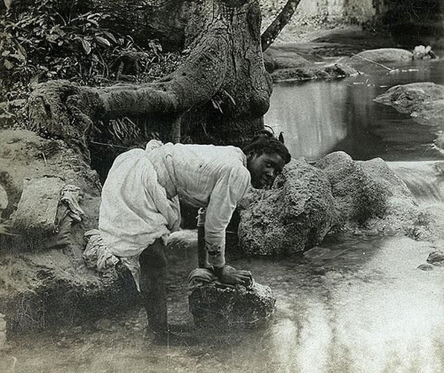 A native wash woman at Bog Walk, Jamaica, 1899.