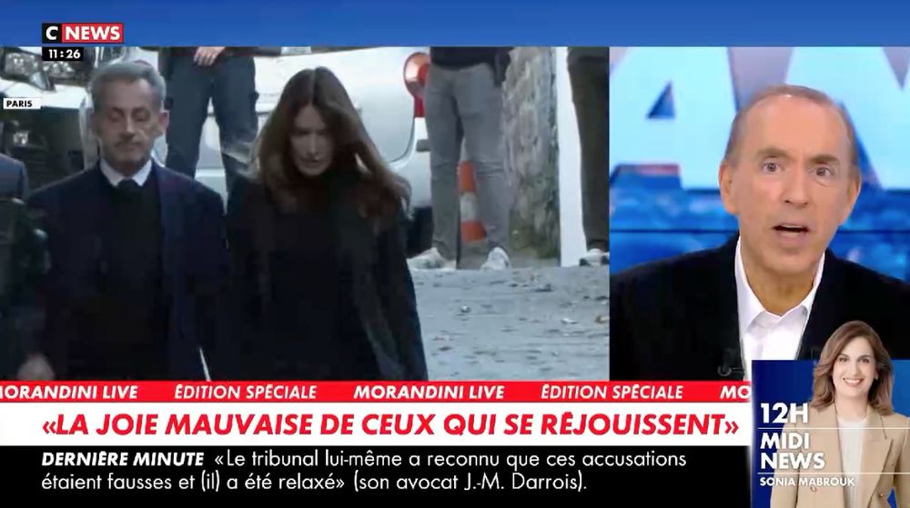 Jean-Marc Morandini sur le plateau de Morandini Live sur CNews. A gauche, rediffusion de l'image de Nicolas Sarkozy et de Carla Bruni quittant leur domicile. Bandeau : “La joie mauvaise de ceux qui se réjouissent” (citation non créditée).