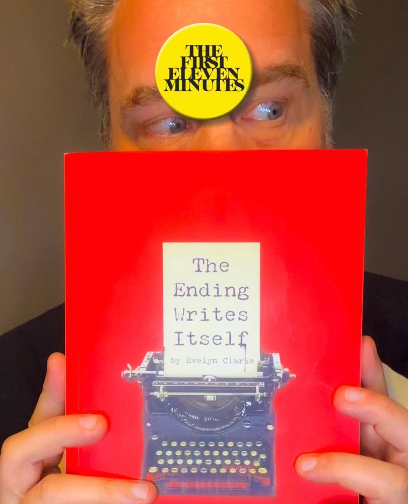 Shifty looking guy with book ‘The Ending Writes Itself’