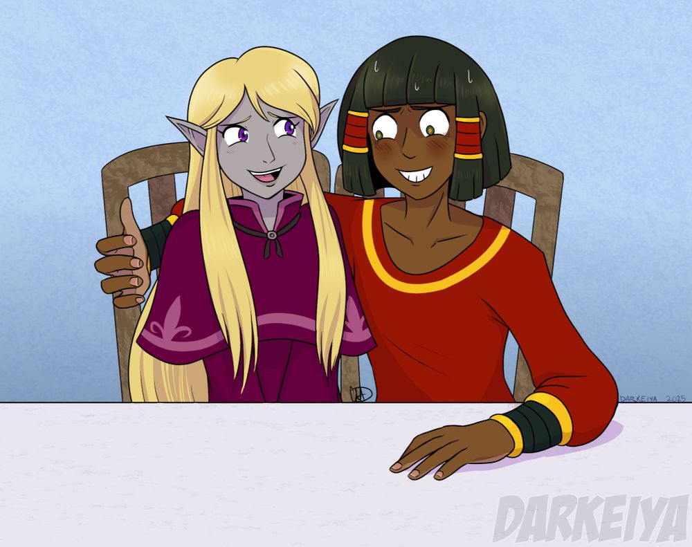 A grey elf girl, L'ira, and a dark-skinned androgynous human, Io, sit at a table together. Io is trying to put their arm around L'ira's shoulder but is stopped by the presently-invisible shape of the elf's current robot body, which is larger than her. Io is giving an enormously awkward and slightly embarrassed smile as L'ira giggles at them.