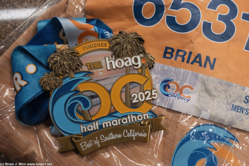 Medal, race bib, and race t-shirt