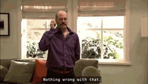 Tobias Funke from Arrested Development holding a recorder to his ear as he reviews the day's recordings. 