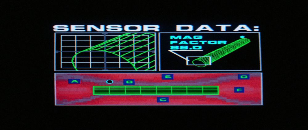 Computer graphic featuring 3 green-on-black wireframe views of the whale probe with the header "SENSOR DATA" rendered in a font that looks like something between Eurostile Extended and a stretched-out Helvetica Bold.