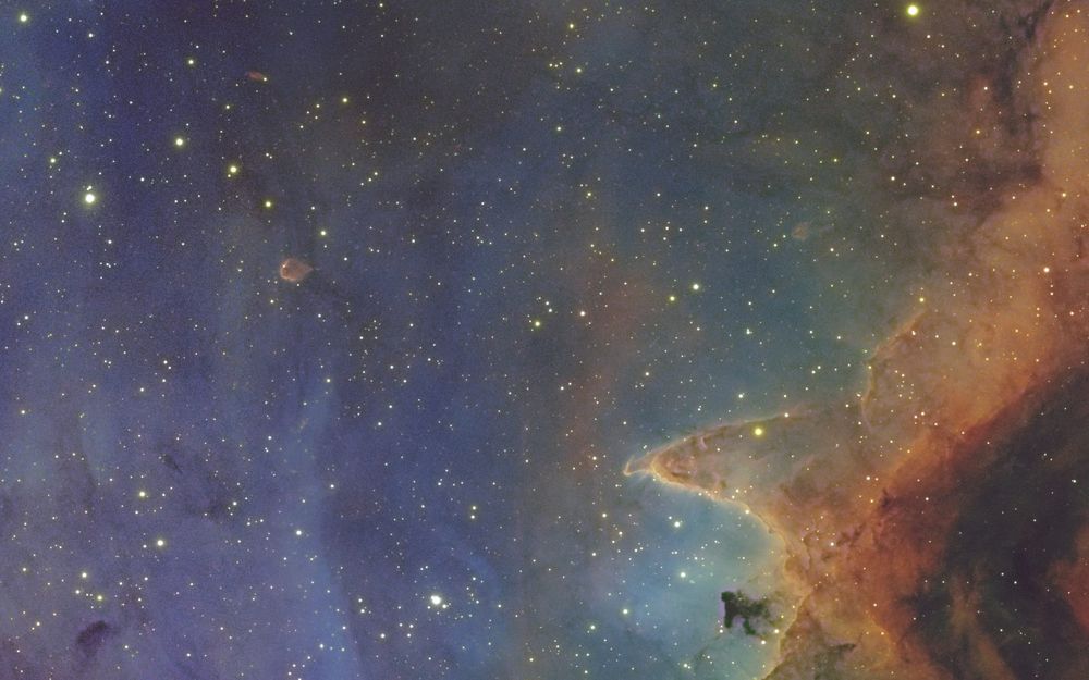 Detail of the Soul Nebula showing a large bok globule distant from other well defined structures.