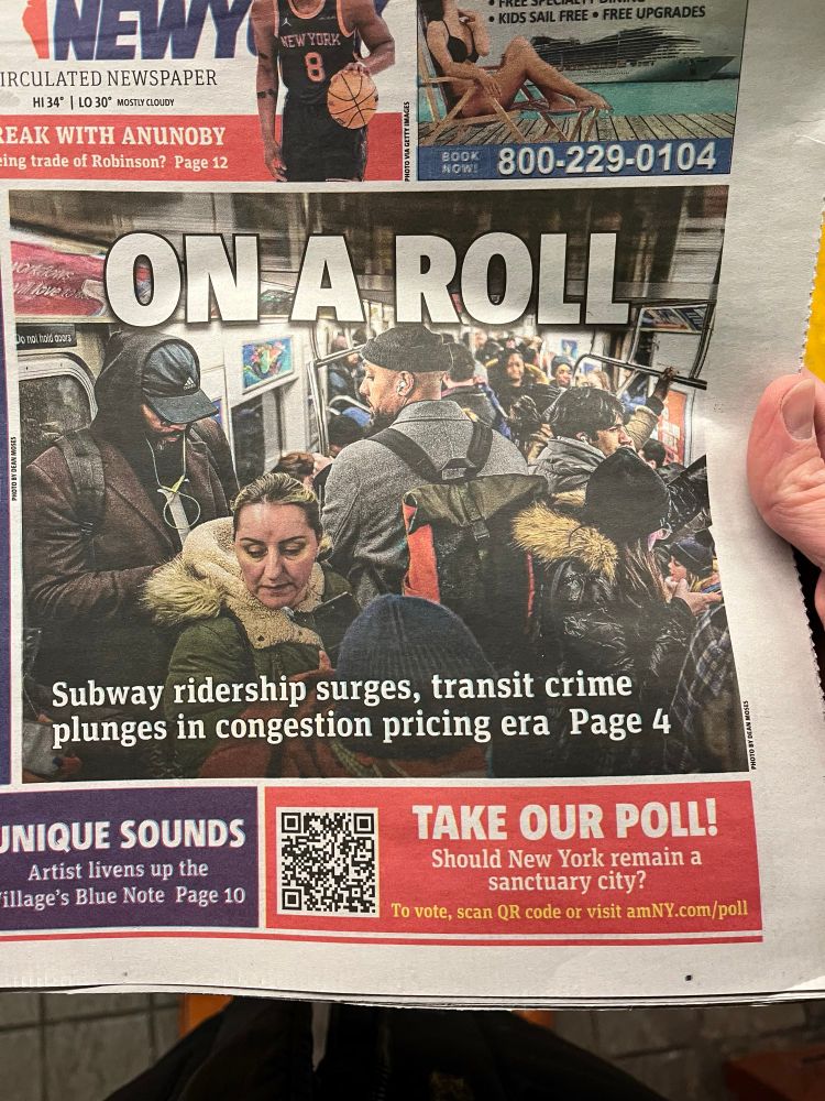 AMNY Newspaper with headline “On a roll: Subway ridership surges, transit crime plunges in congestion pricing era”