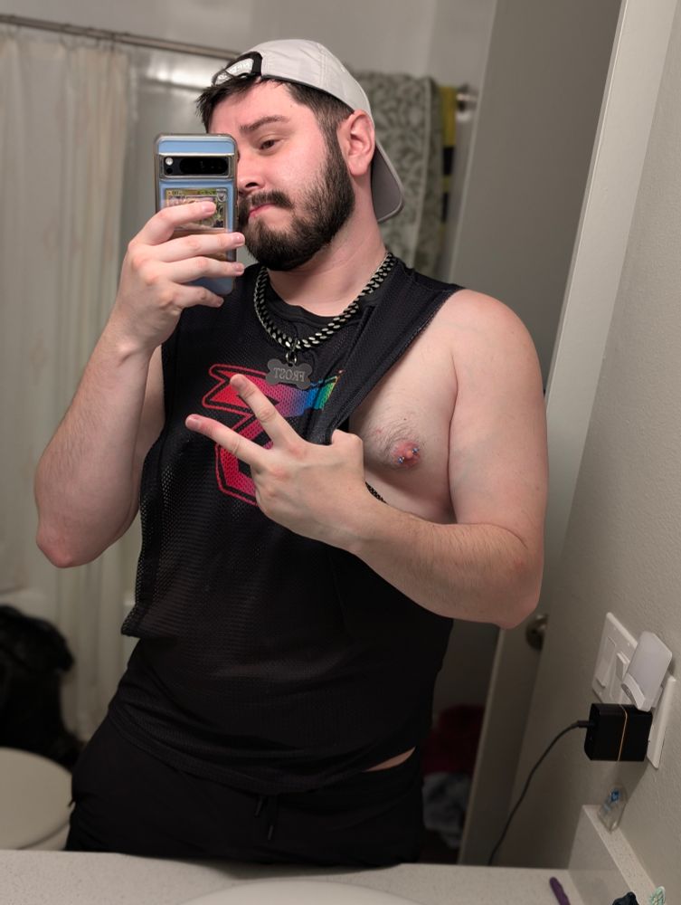 Human Frost showing his new nipple piercings. 