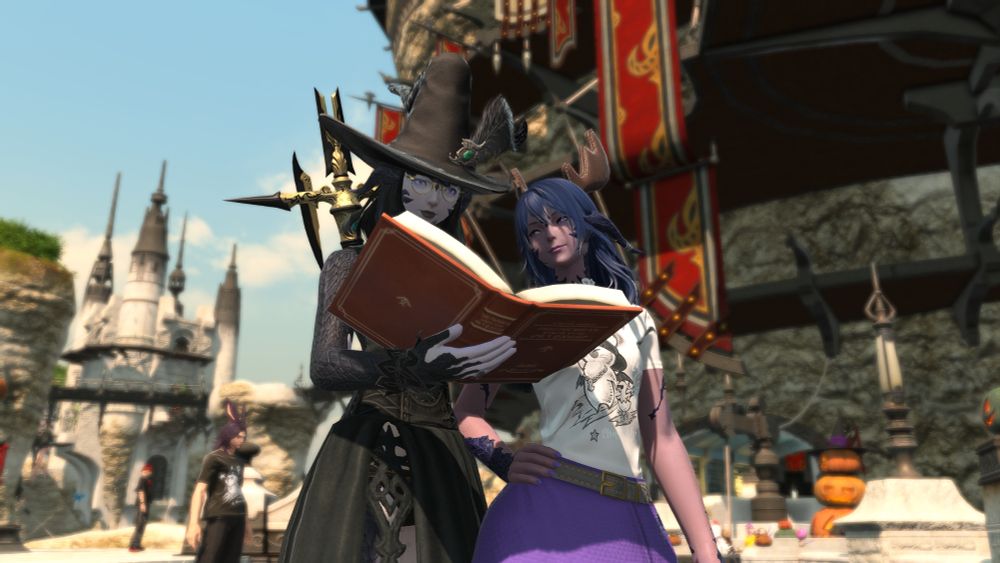 May Luna and Qutlun Dotharl are pictured standing side by side in limsa. May is holding a book and is focused intently on its contents, while Qutlun locked her right arm with May's left and is staring directly at May's face with a lovestruck smile.