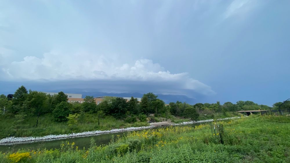 Looming cloud seen across the Chicago River. 