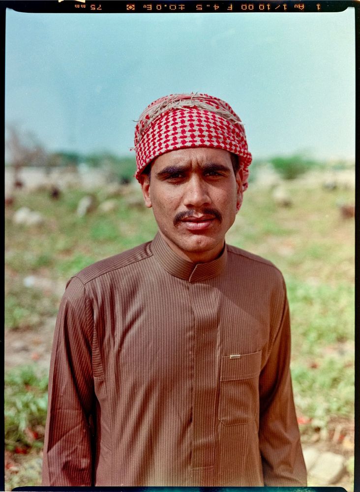 A man stares directly at the camera. 